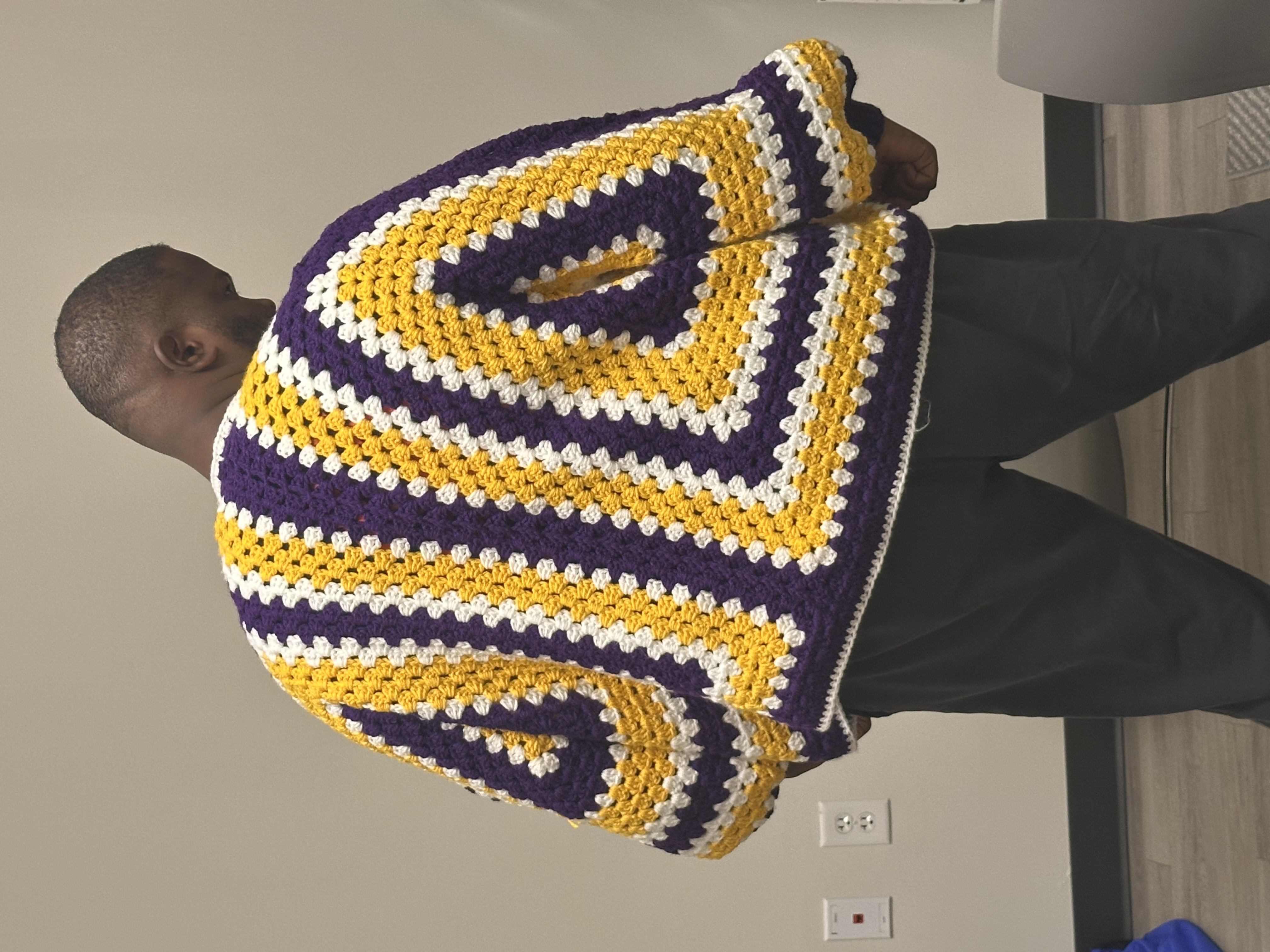 Model wearing women's black cotton crewneck tee.